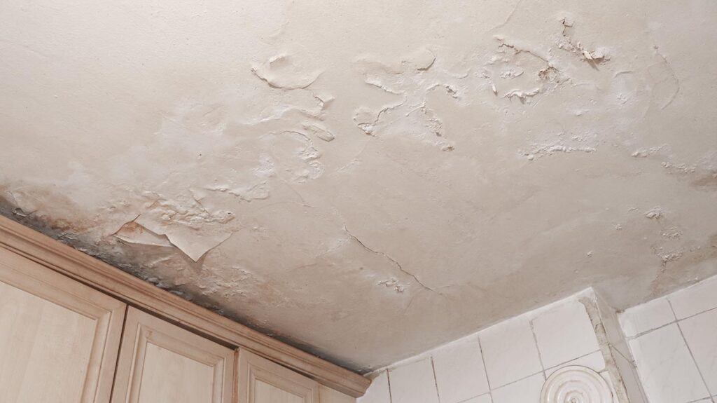 dirty,and,worn,interior,ceiling,after,water,leak.,water,damage